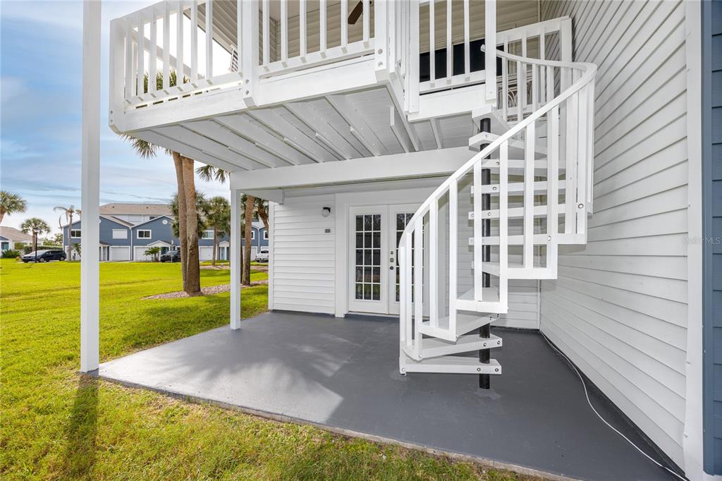 816 Hidden Harbour Drive Indian Rocks Beach, FL 33785 - Photo 38 of 58 a view of a house with backyard and porch