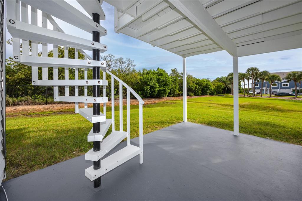 816 Hidden Harbour Drive Indian Rocks Beach, FL 33785 - Photo 39 of 58 a view of a house with a yard