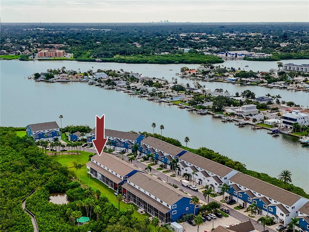 816 Hidden Harbour Drive Indian Rocks Beach, FL 33785 - Photo 44 of 58 an aerial view of a house with a lake view