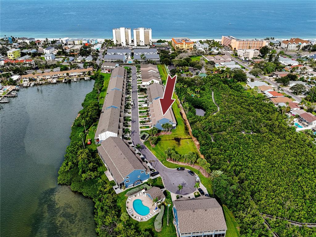 816 Hidden Harbour Drive Indian Rocks Beach, FL 33785 - Photo 45 of 58 an aerial view of a house with a lake view