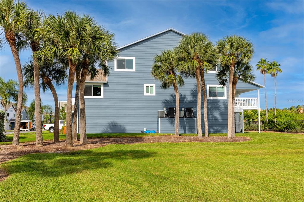 816 Hidden Harbour Drive Indian Rocks Beach, FL 33785 - Photo 57 of 58 a house view with a garden space