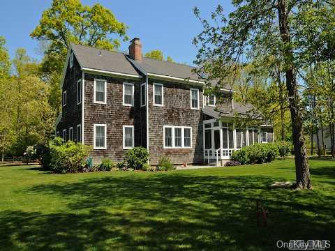 Glorious and stately Home on Shy 8 Acres with 2 large, additional buildings