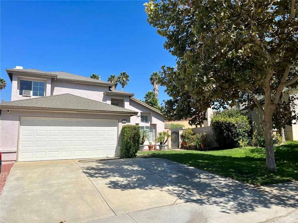 726 Blake Road Riverside, CA 92501 - Photo 1 of 1 a view of a house with a yard