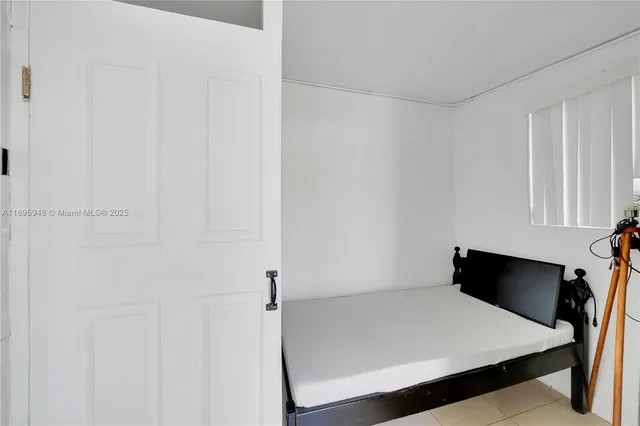 a room with a table and chairs