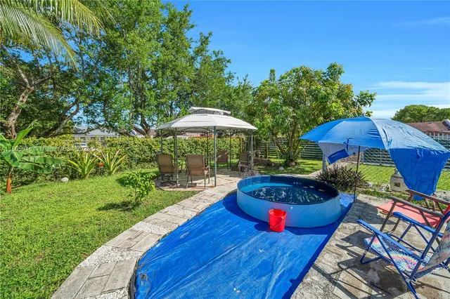 a garden view with a seating space