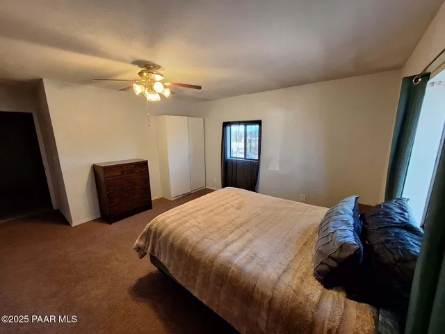 a kitchen with stainless steel appliances granite countertop a sink and a stove