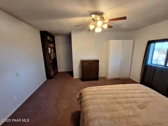 a view of a kitchen with wooden floor