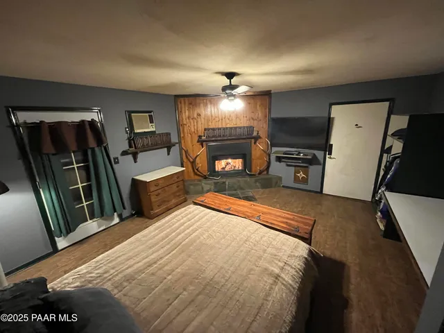 a spacious bathroom with a double vanity sink a mirror and a shower