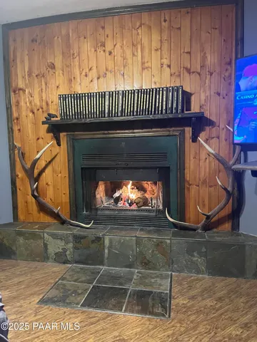 a workspace with furniture and mirror