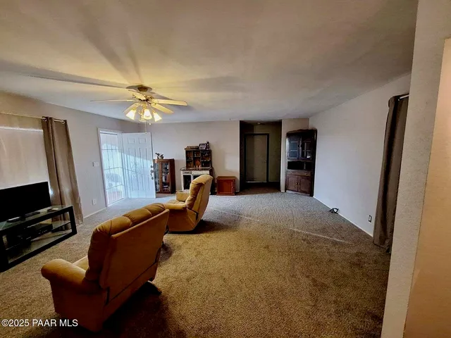 a view of a kitchen with wooden floor