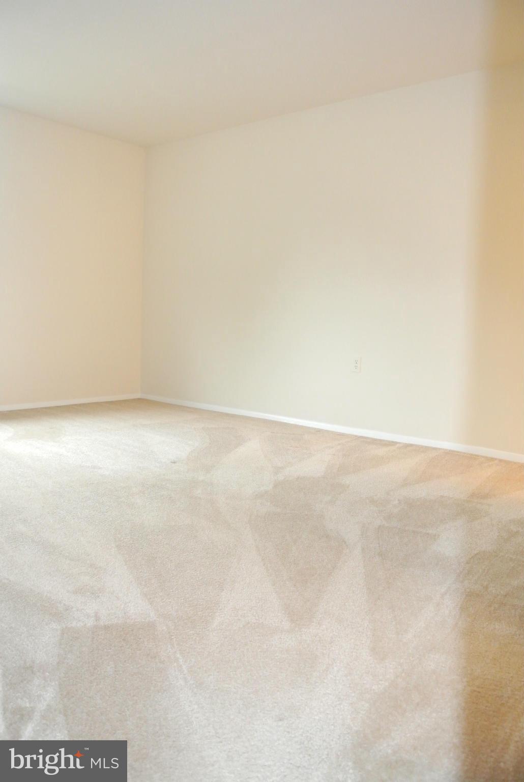 18712 Walkers Choice Road, Unit 4 Montgomery Village, MD 20886 - Photo 13 of 15 a view of empty room