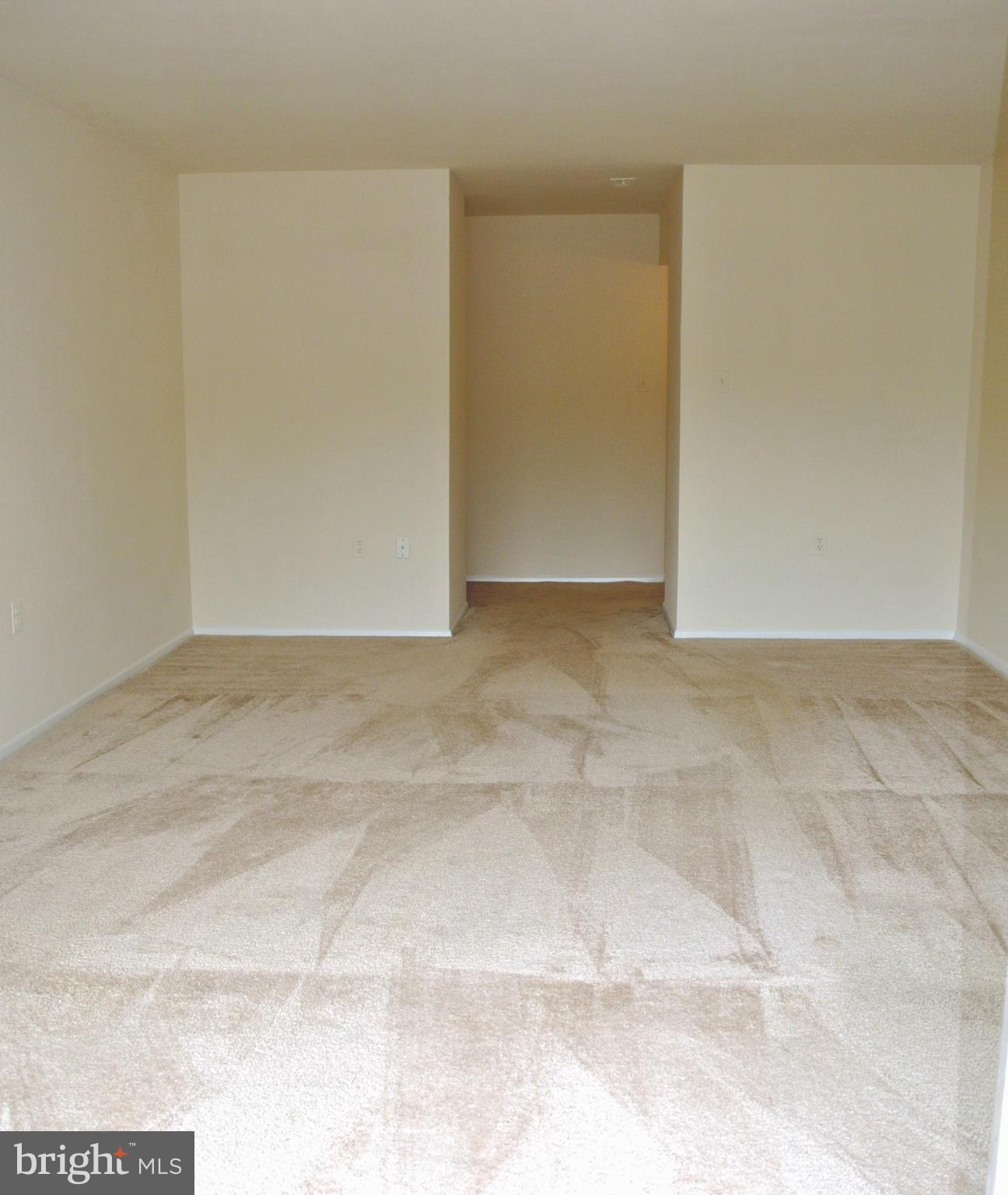 18712 Walkers Choice Road, Unit 4 Montgomery Village, MD 20886 - Photo 4 of 15 a view of an empty room