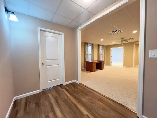 a view of a livingroom with furniture