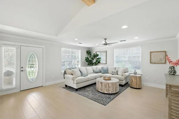 a living room with furniture and window