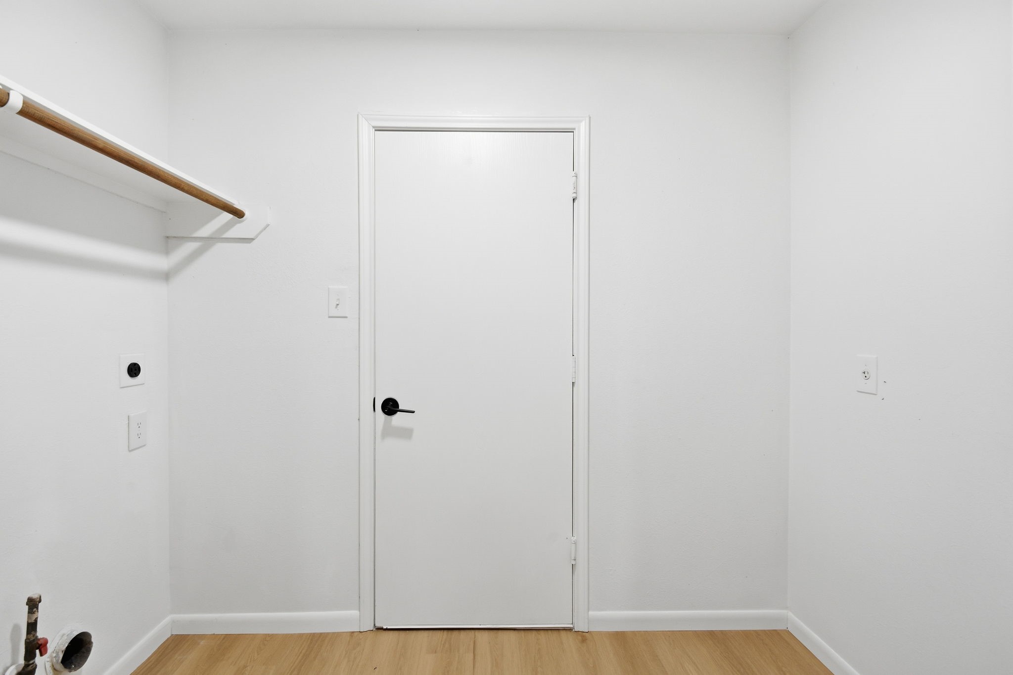 4426 Kulkarni Street Houston, TX 77045 - Photo 29 of 33 a view of a room with wooden floor