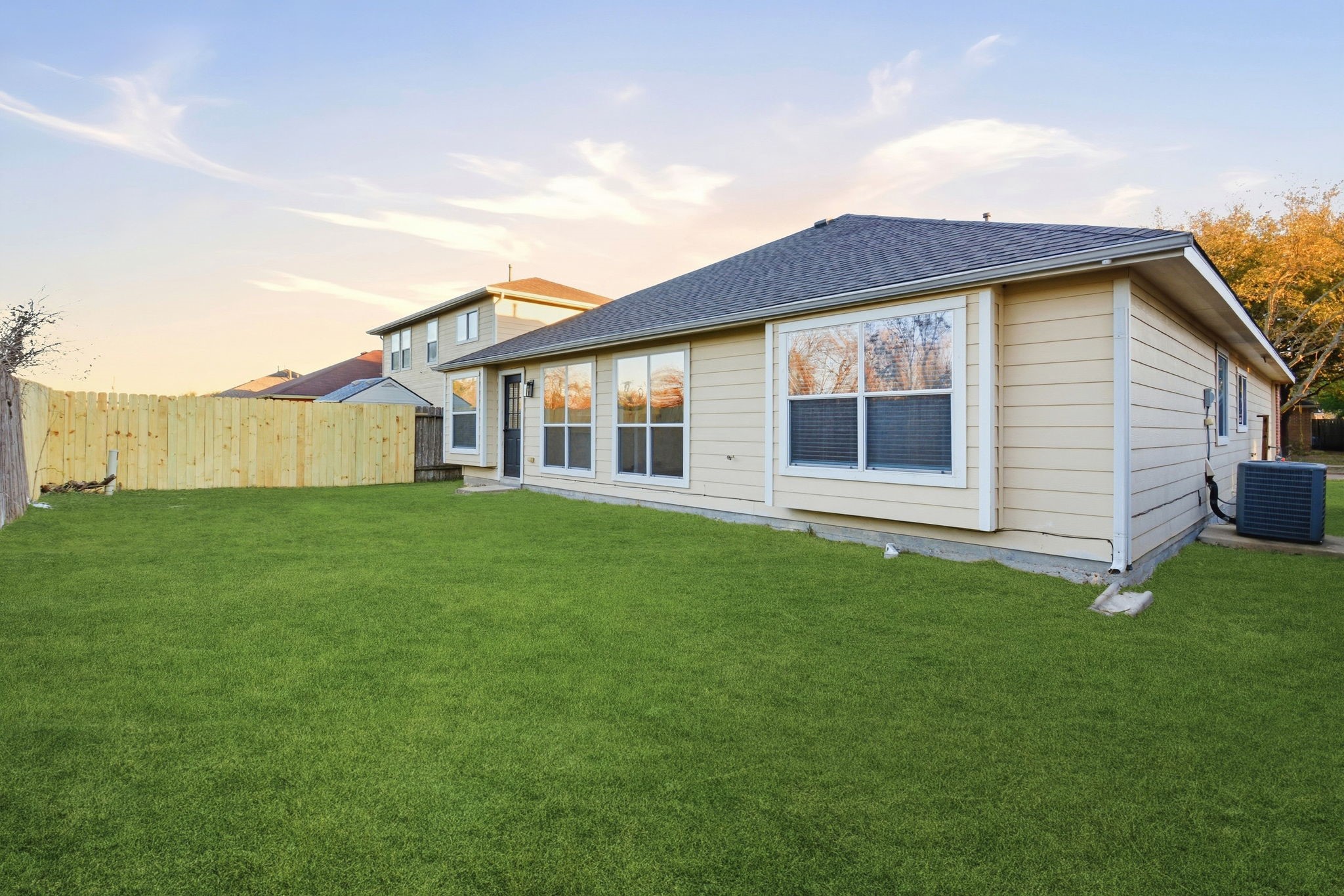 4426 Kulkarni Street Houston, TX 77045 - Photo 30 of 33 a view of a house with a backyard