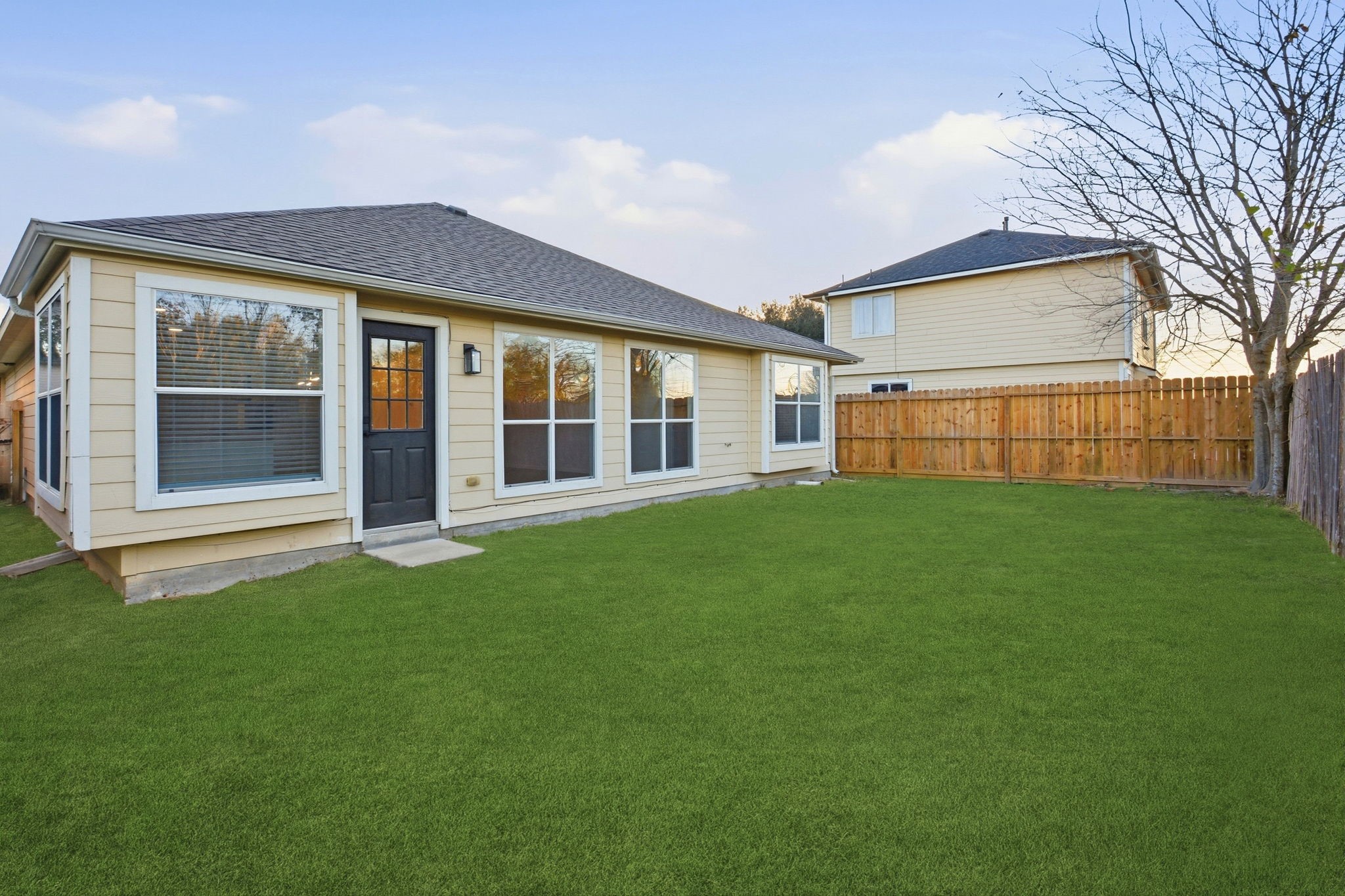 4426 Kulkarni Street Houston, TX 77045 - Photo 32 of 33 a view of house with backyard and garden