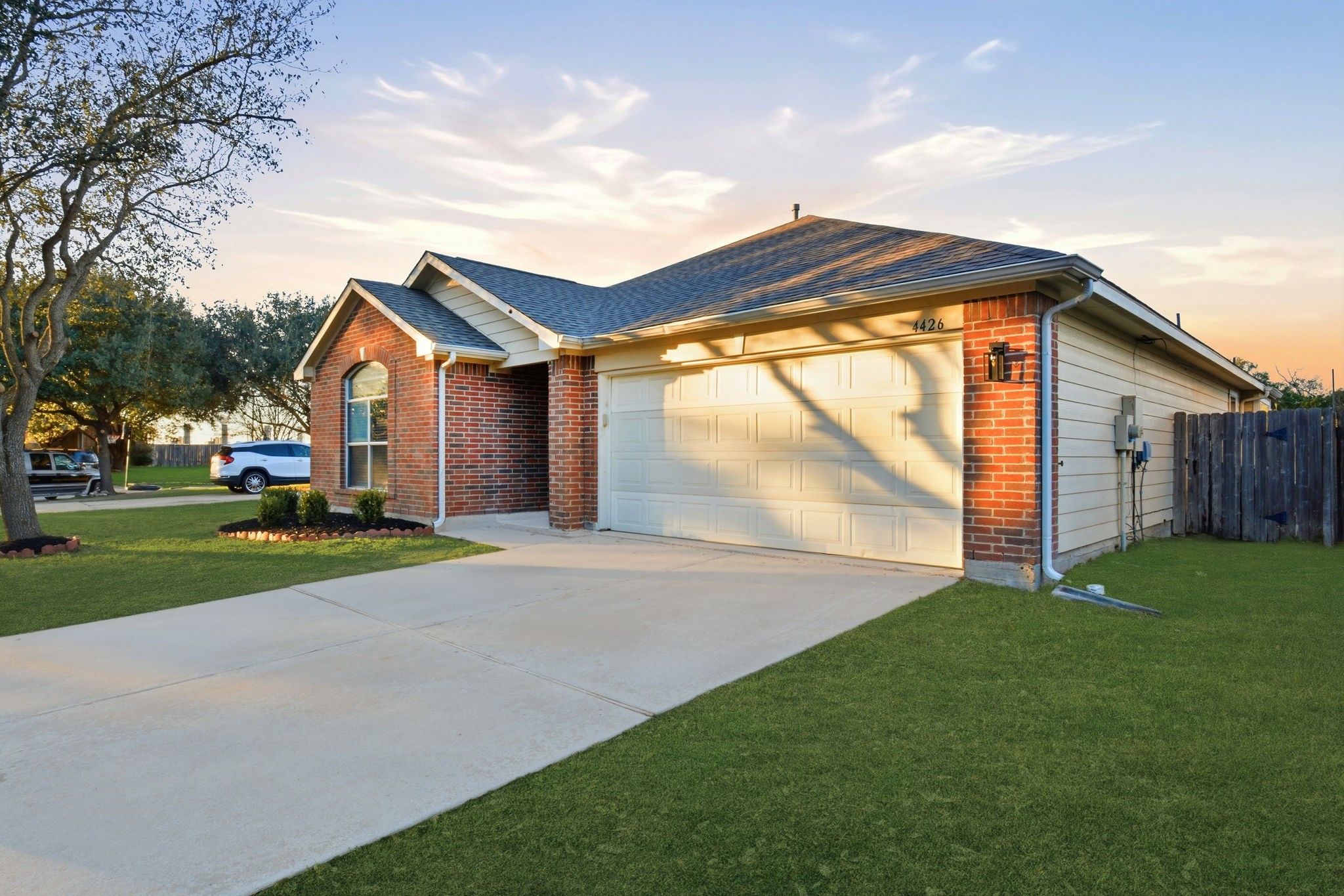 4426 Kulkarni Street Houston, TX 77045 - Photo 5 of 33 a view of a house with a yard