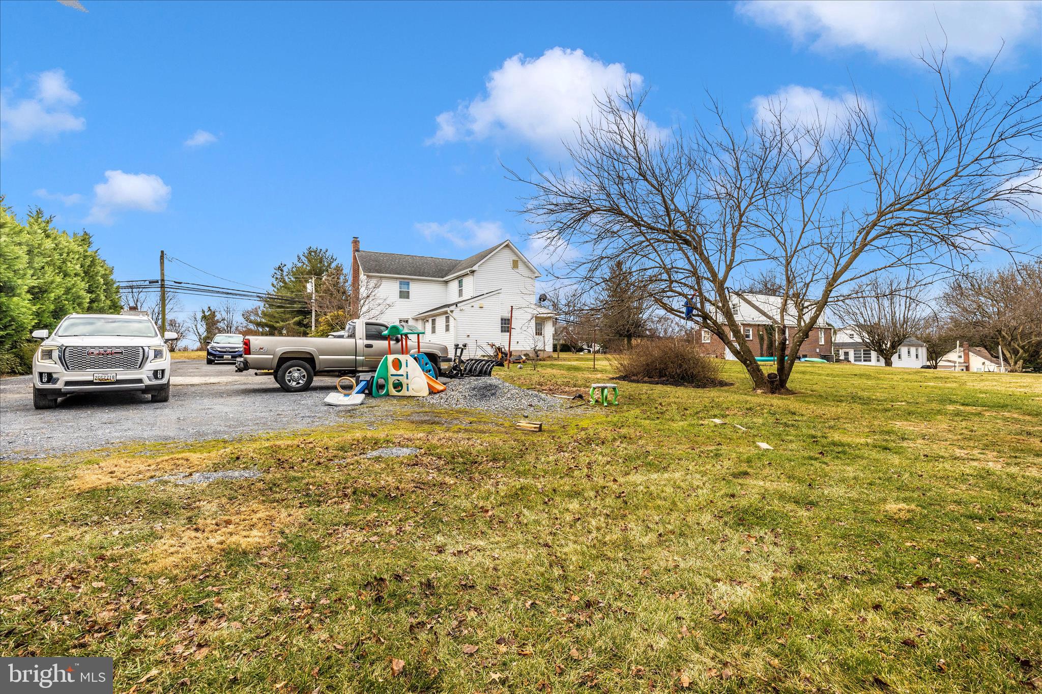 9507 Main Street Damascus, MD 20872 - Photo 13 of 51 a view of the street with houses