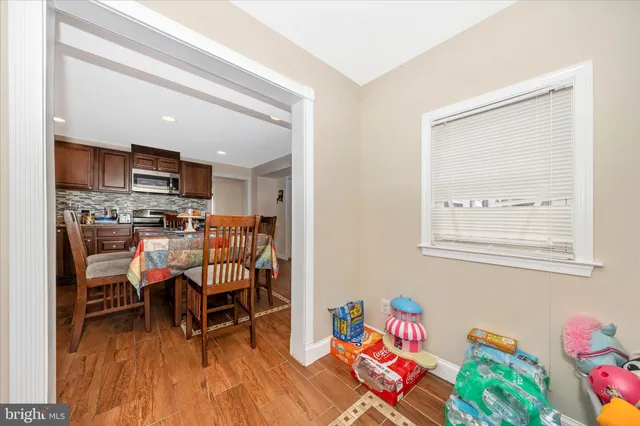 a front view of a house with a fountain