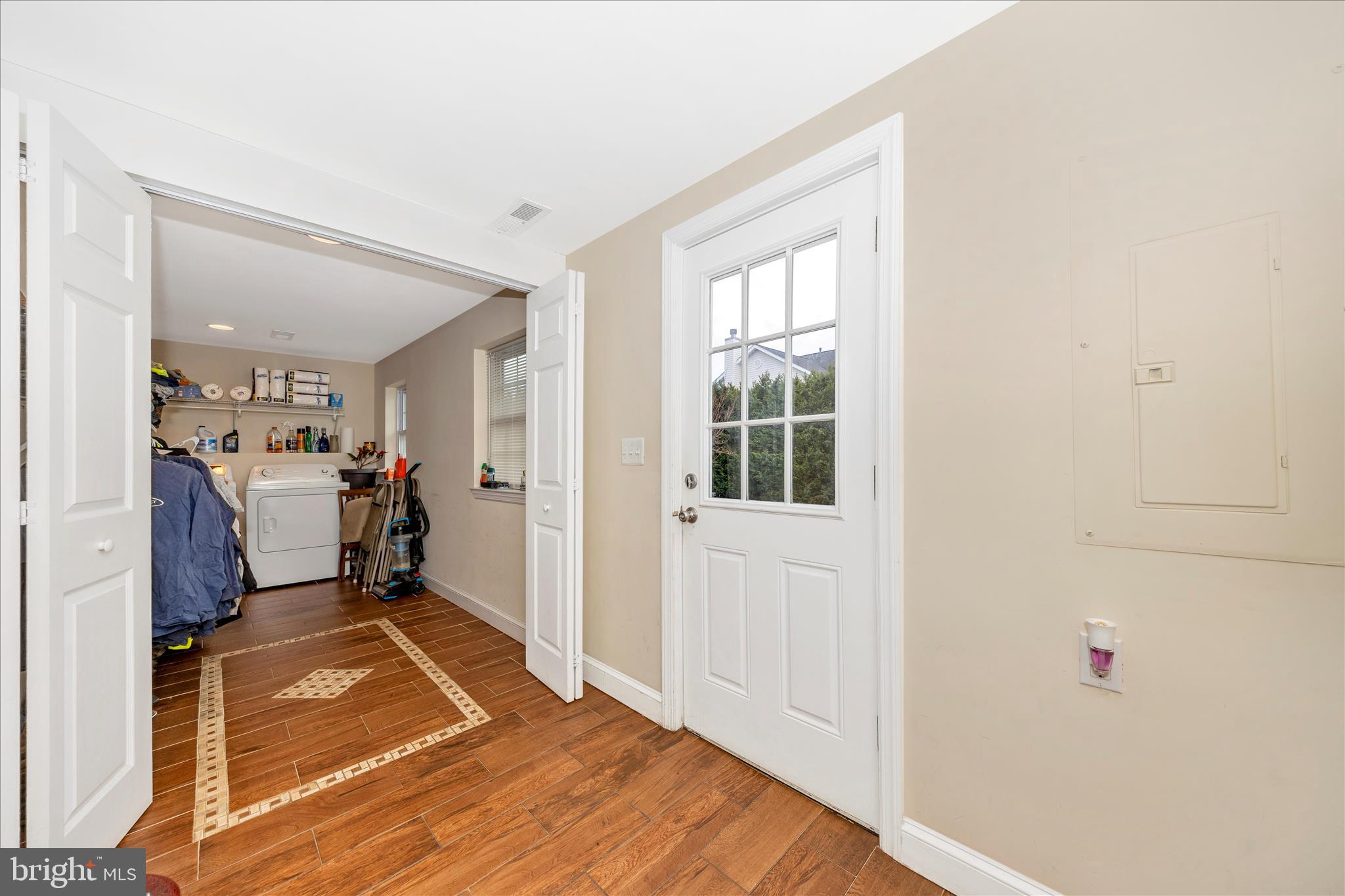 9507 Main Street Damascus, MD 20872 - Photo 31 of 51 a room with storage and utility