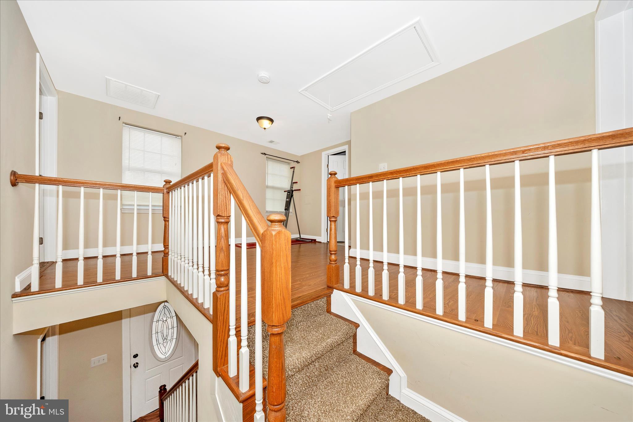 9507 Main Street Damascus, MD 20872 - Photo 37 of 51 a view of a hallway with staircase
