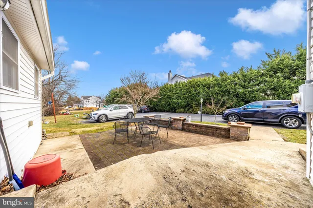 a view of a swimming pool with lounge chairs