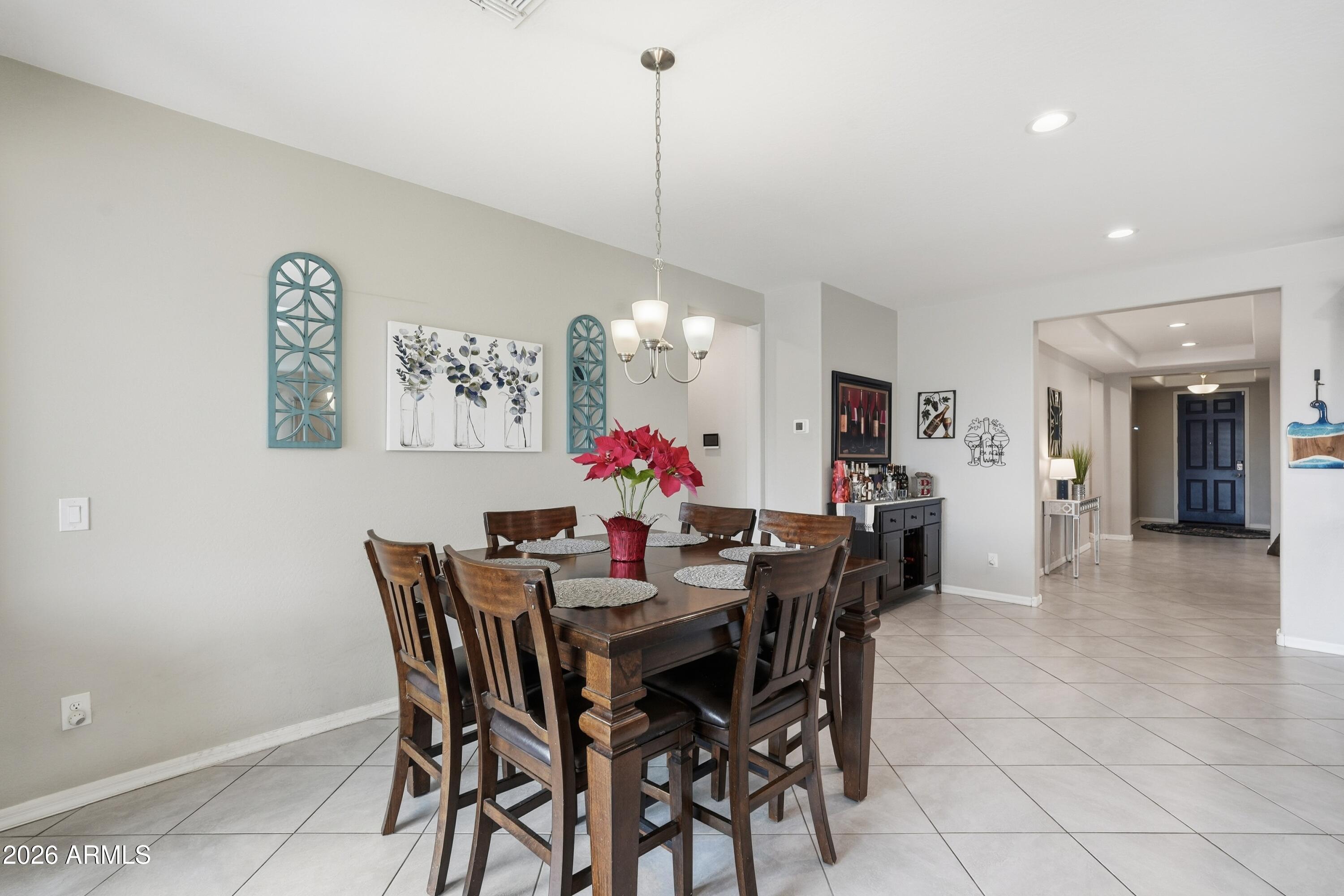 15727 West Madison Street Goodyear, AZ 85338 - Photo 19 of 41 a view of a dining room with furniture