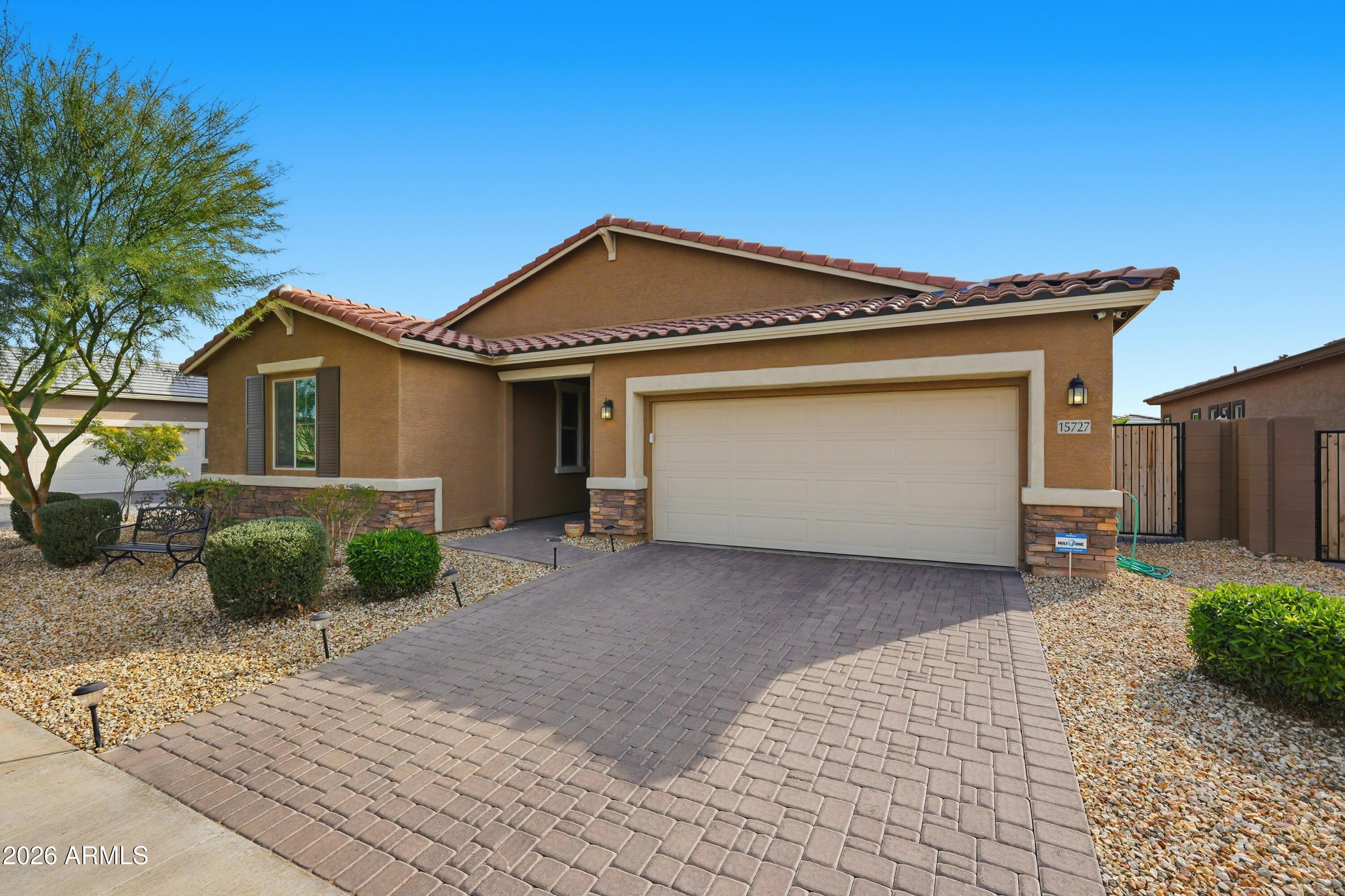 15727 West Madison Street Goodyear, AZ 85338 - Photo 2 of 41 a view of a house with a outdoor space