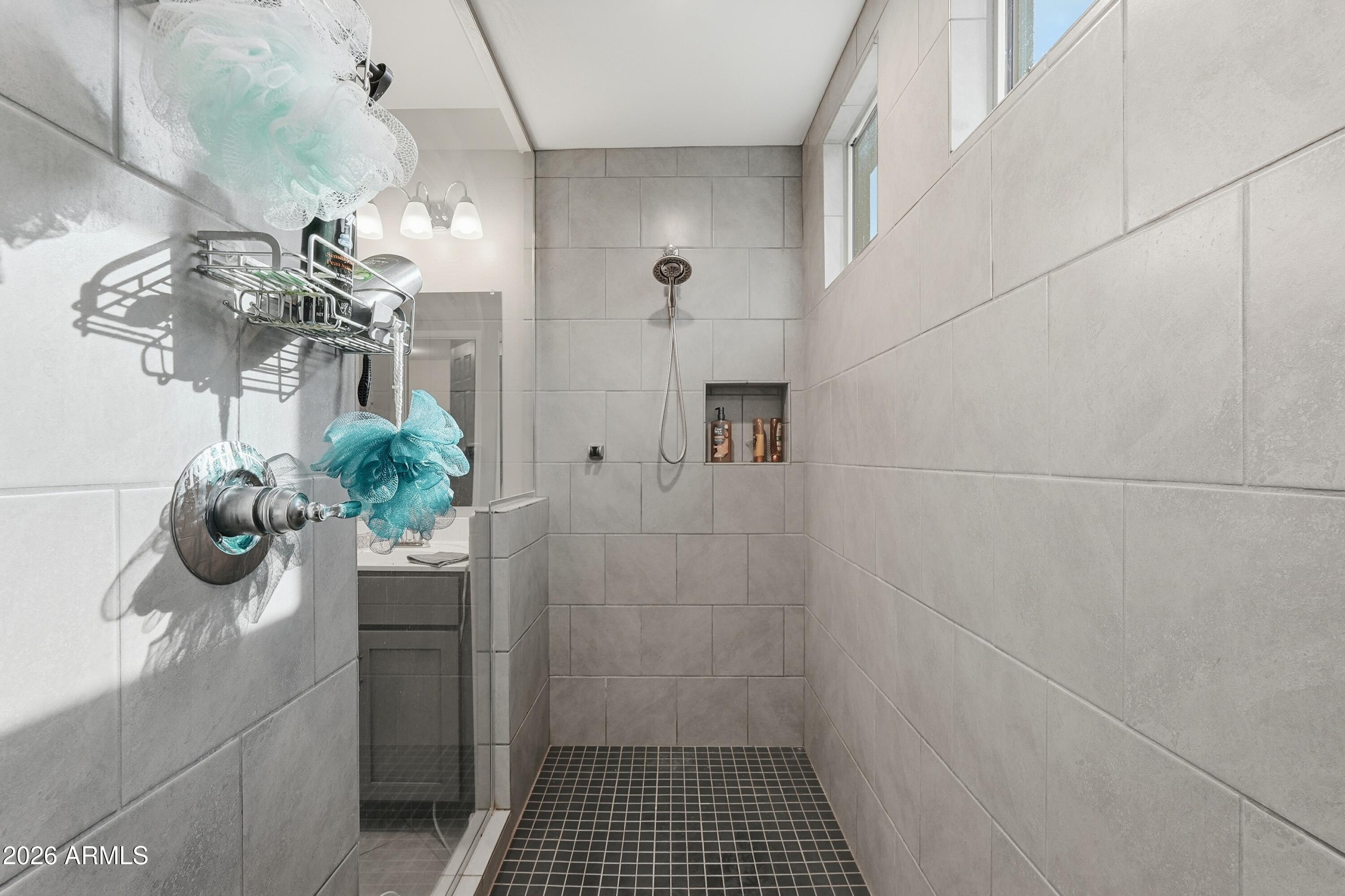 15727 West Madison Street Goodyear, AZ 85338 - Photo 29 of 41 a bathroom with a shower