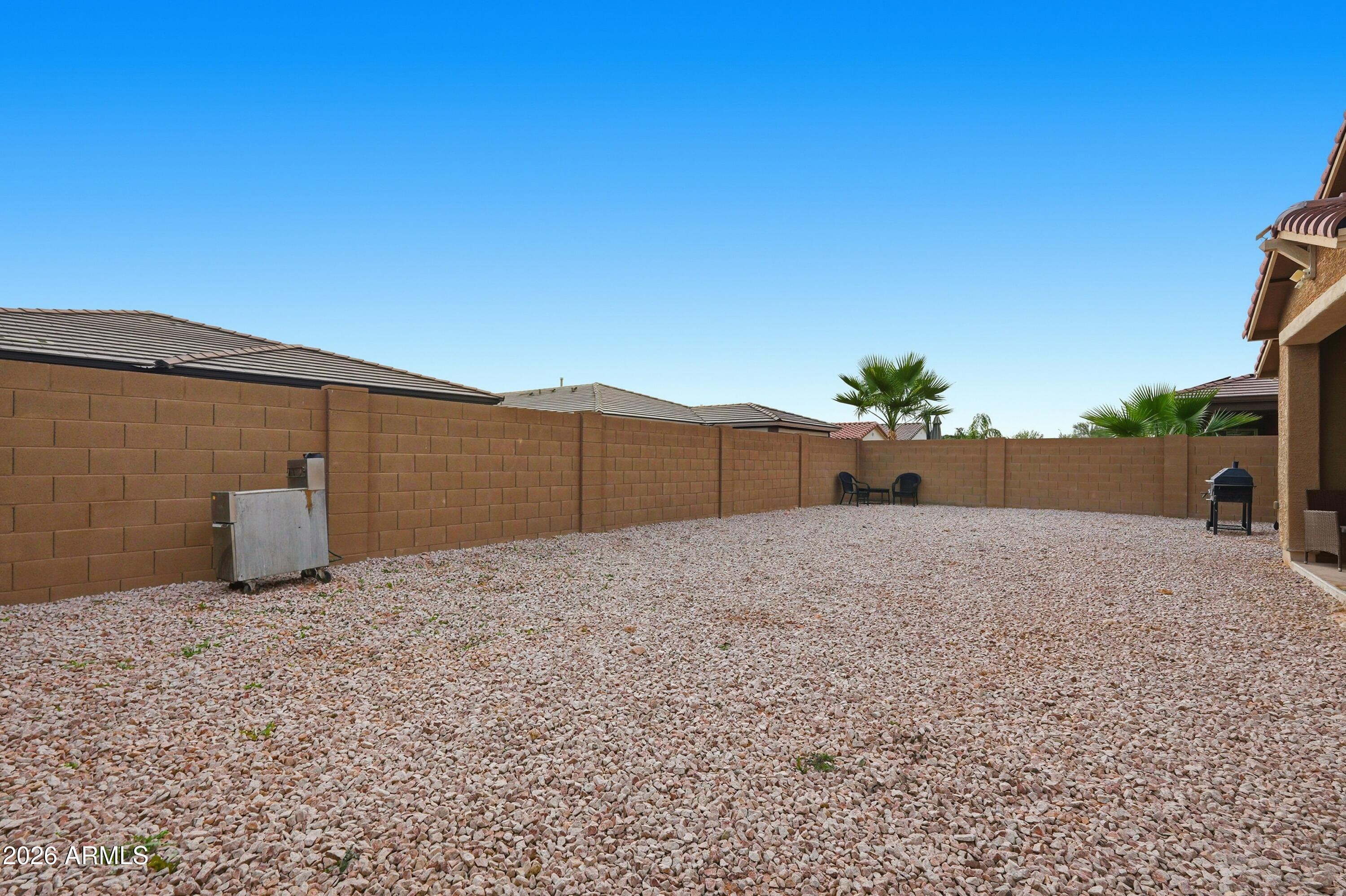 15727 West Madison Street Goodyear, AZ 85338 - Photo 39 of 41 a view of a backyard