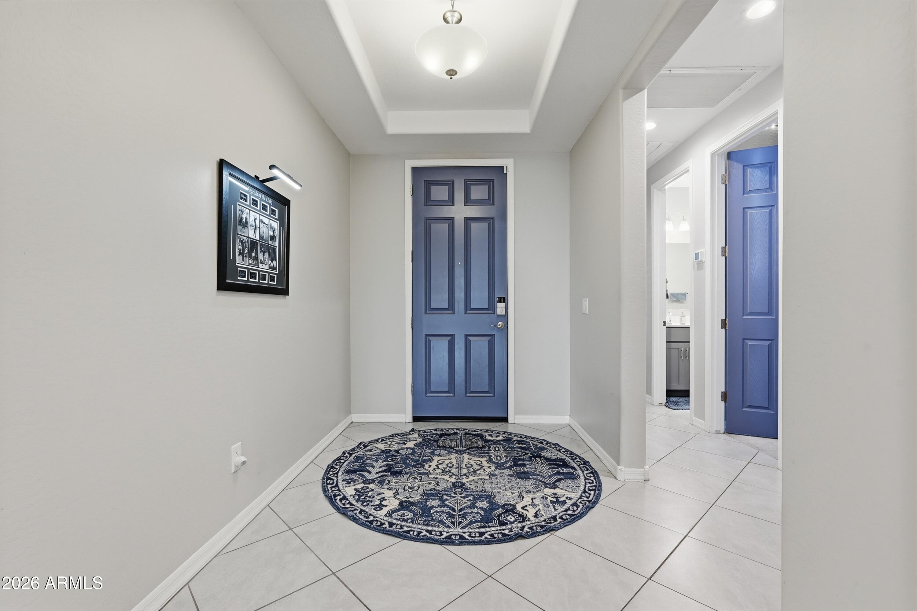 15727 West Madison Street Goodyear, AZ 85338 - Photo 5 of 41 a view of a hallway with closet