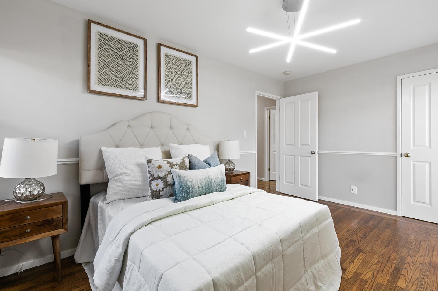 117 Hedge Road Menlo Park, CA 94025 - Photo 14 of 23 a bedroom with a bed and a ceiling fan