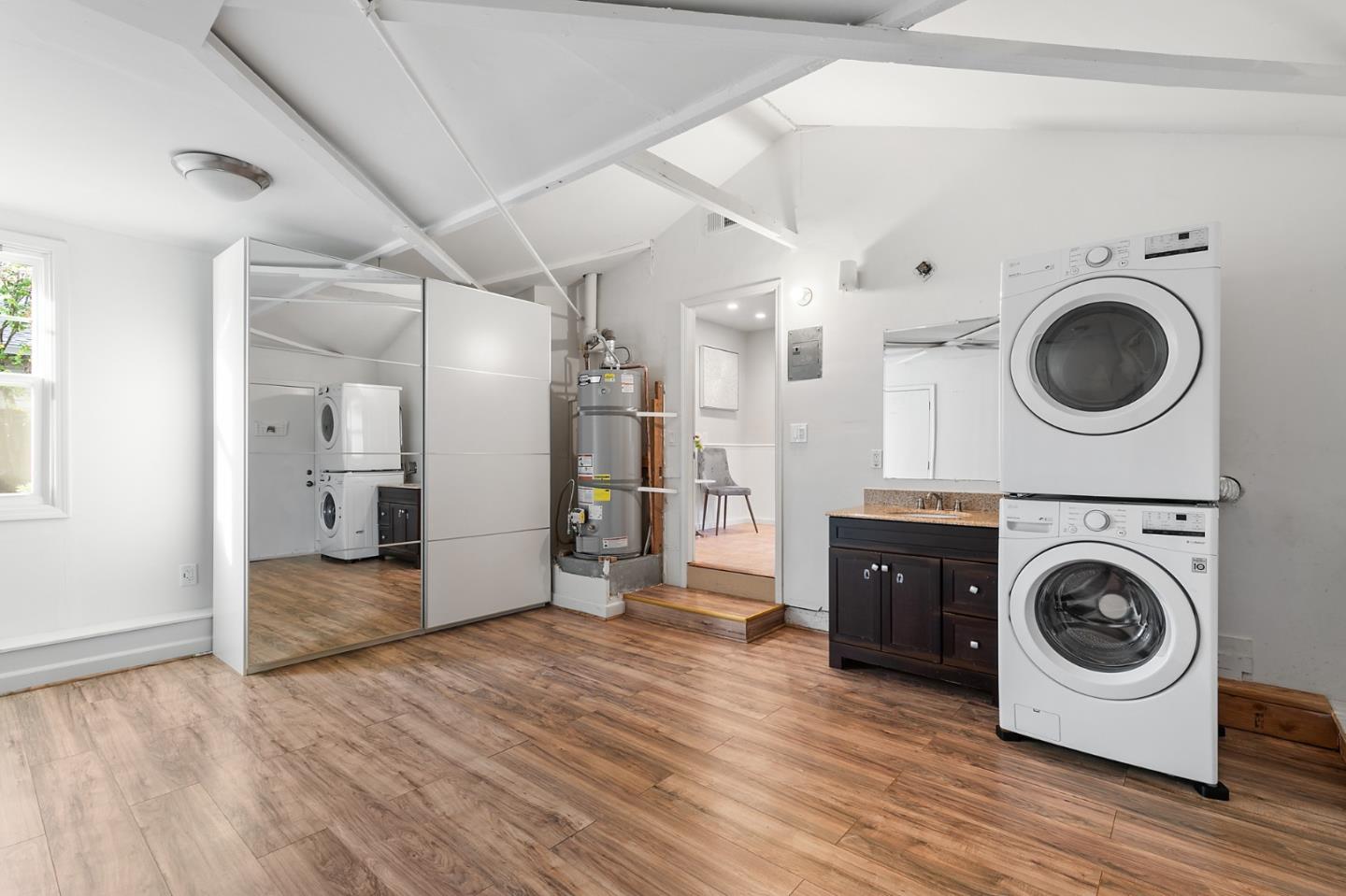117 Hedge Road Menlo Park, CA 94025 - Photo 20 of 23 a view of a hallway with washer and dryer