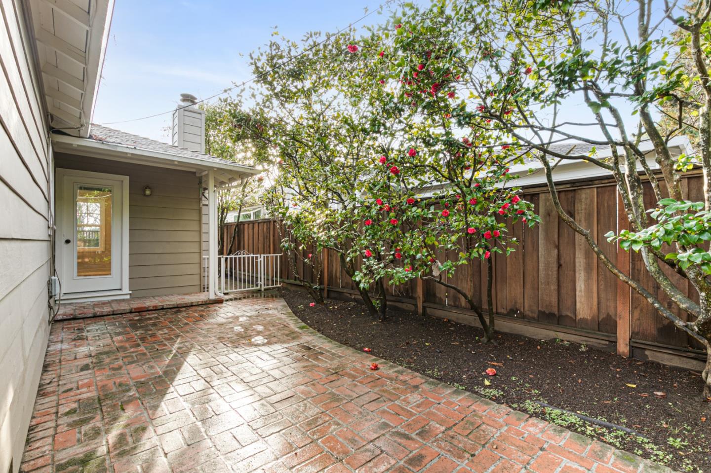 117 Hedge Road Menlo Park, CA 94025 - Photo 21 of 23 a view of a house with a yard