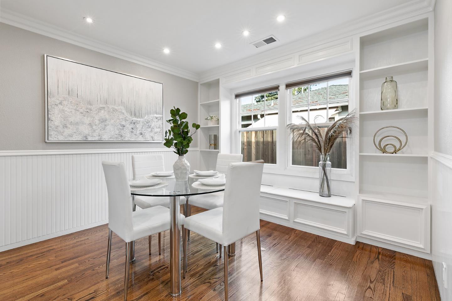 117 Hedge Road Menlo Park, CA 94025 - Photo 7 of 23 a dining room with furniture and wooden floor
