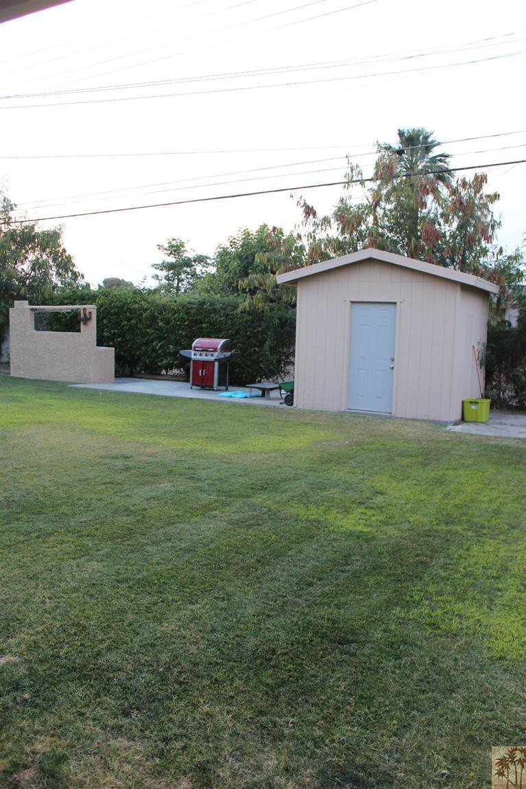 82376 Adobe Road Indio, CA 92201 - Photo 7 of 7 a view of a big yard with an outdoor seating