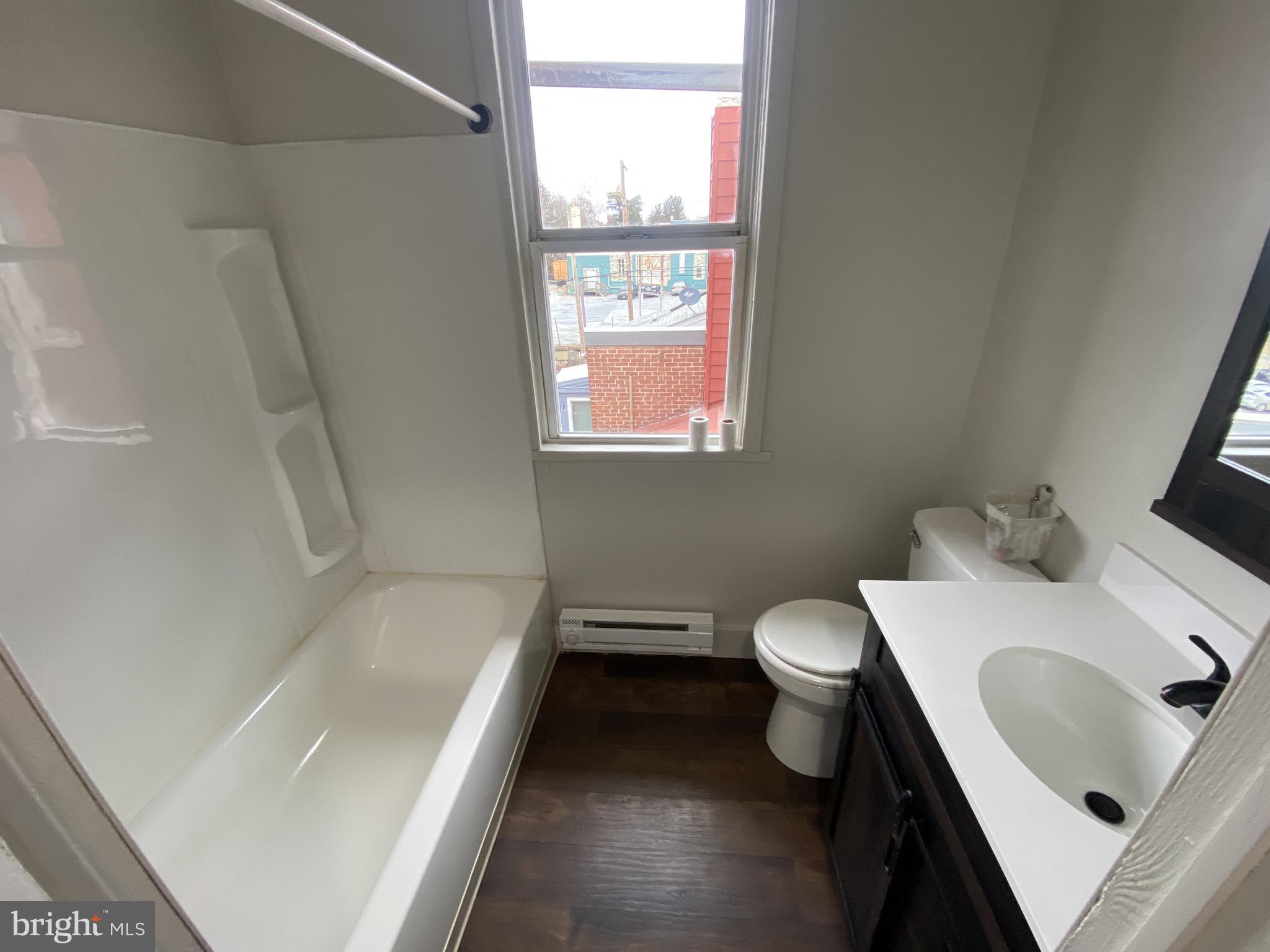 508 South Prince Street Lancaster, PA 17603 - Photo 11 of 21 a bathroom with a sink toilet and tub