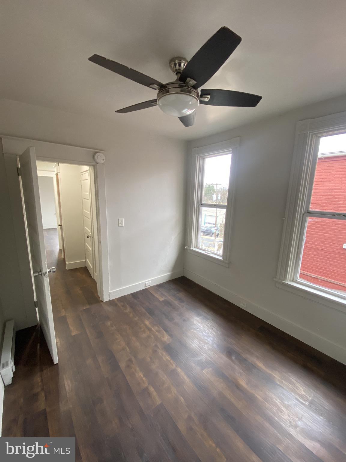 508 South Prince Street Lancaster, PA 17603 - Photo 12 of 21 wooden floor in an empty room with a window