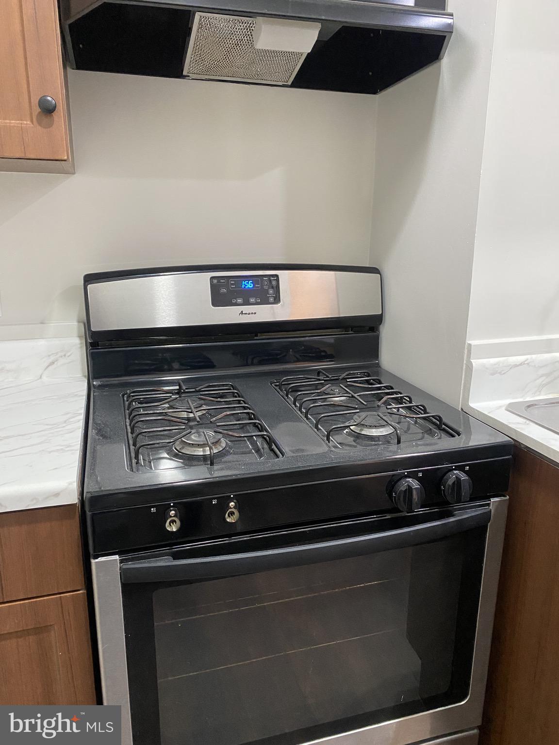 508 South Prince Street Lancaster, PA 17603 - Photo 15 of 21 a stove top oven sitting inside of a kitchen