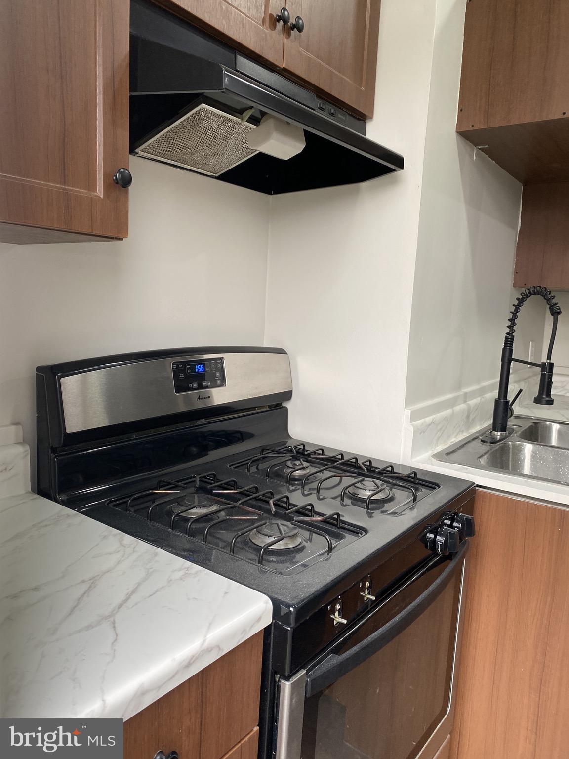 508 South Prince Street Lancaster, PA 17603 - Photo 16 of 21 a stove top oven sitting inside of a kitchen