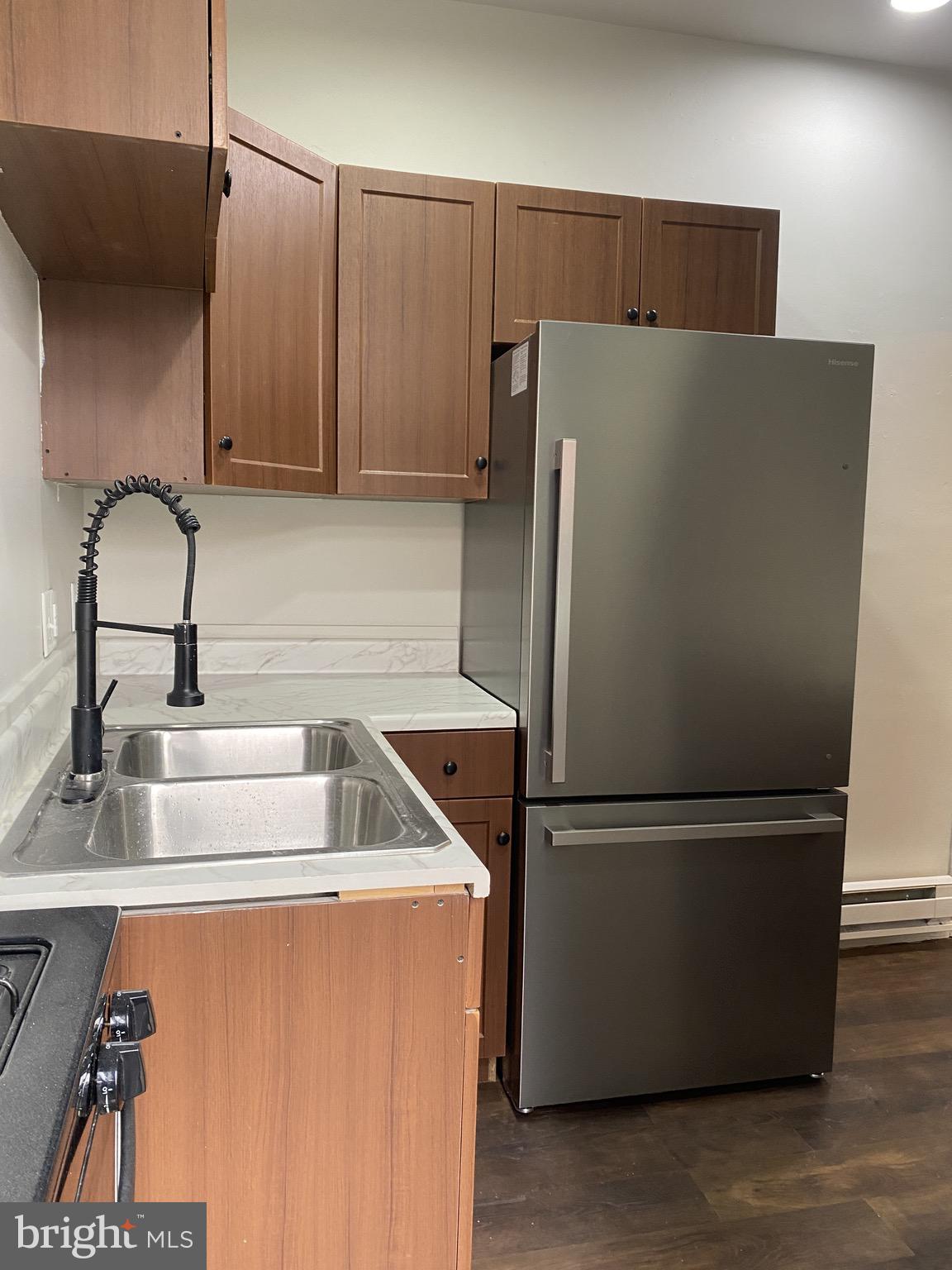 508 South Prince Street Lancaster, PA 17603 - Photo 17 of 21 a kitchen with refrigerator and cabinets