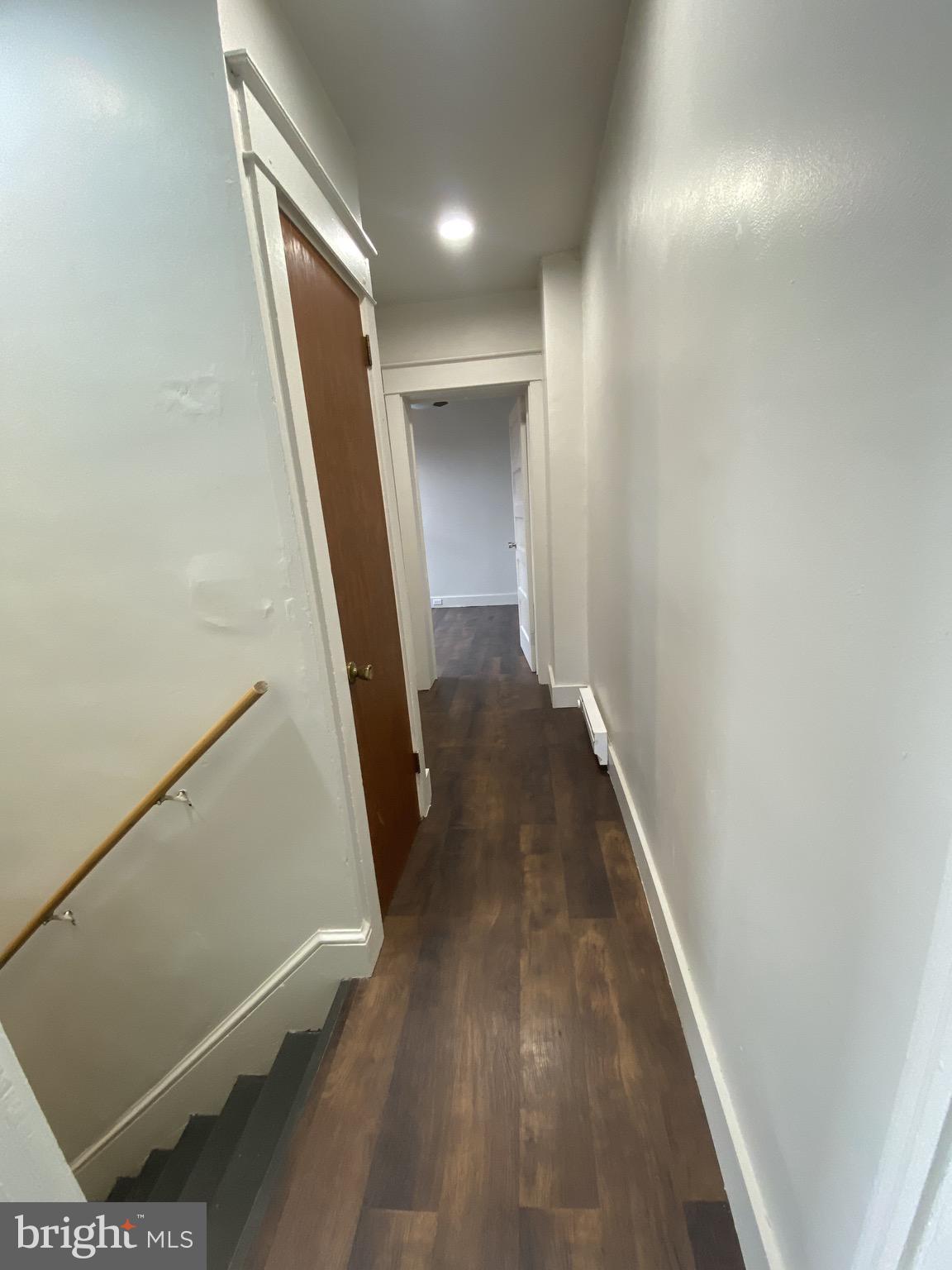 508 South Prince Street Lancaster, PA 17603 - Photo 8 of 21 a view of a hallway with wooden floor and staircase