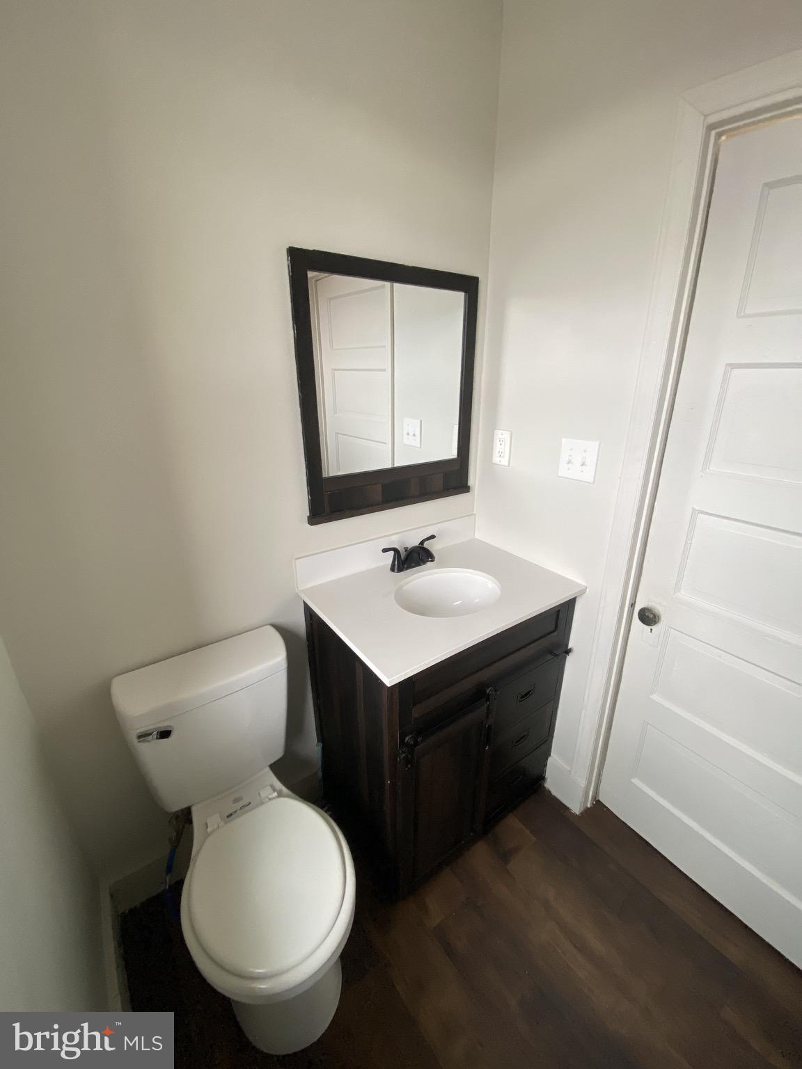 508 South Prince Street Lancaster, PA 17603 - Photo 9 of 21 a bathroom with a toilet sink and mirror