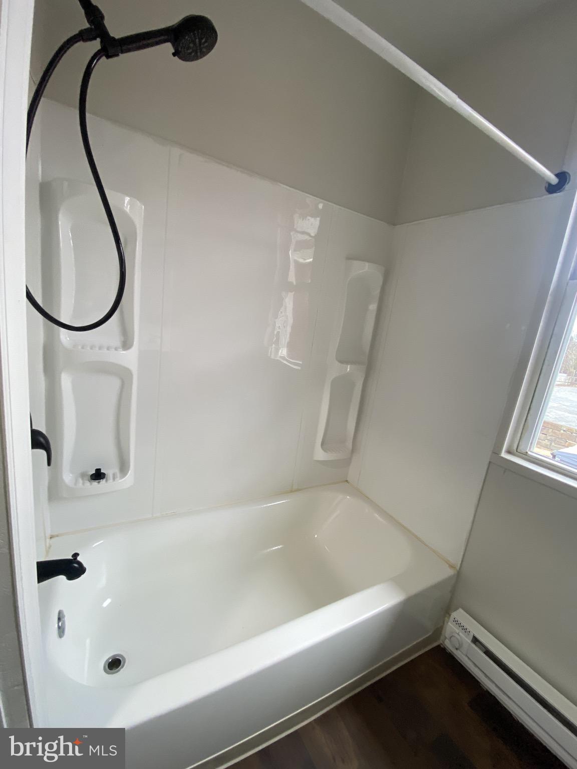 508 South Prince Street Lancaster, PA 17603 - Photo 10 of 21 a bathroom with a bath tub and a shower