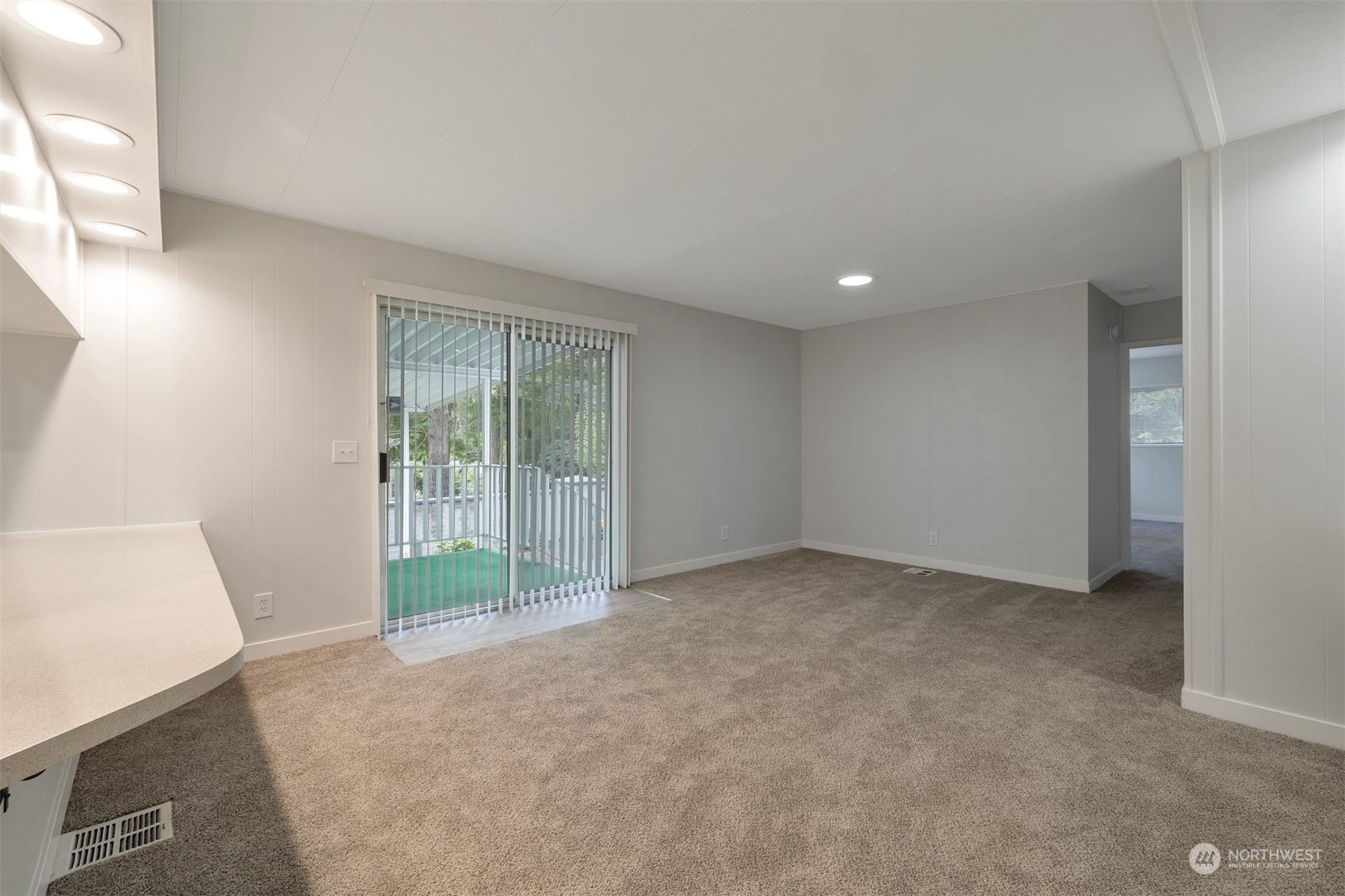1121 244th Street Southwest, Unit 1 Bothell, WA 98021 - Photo 11 of 25 a view of an empty room with a window