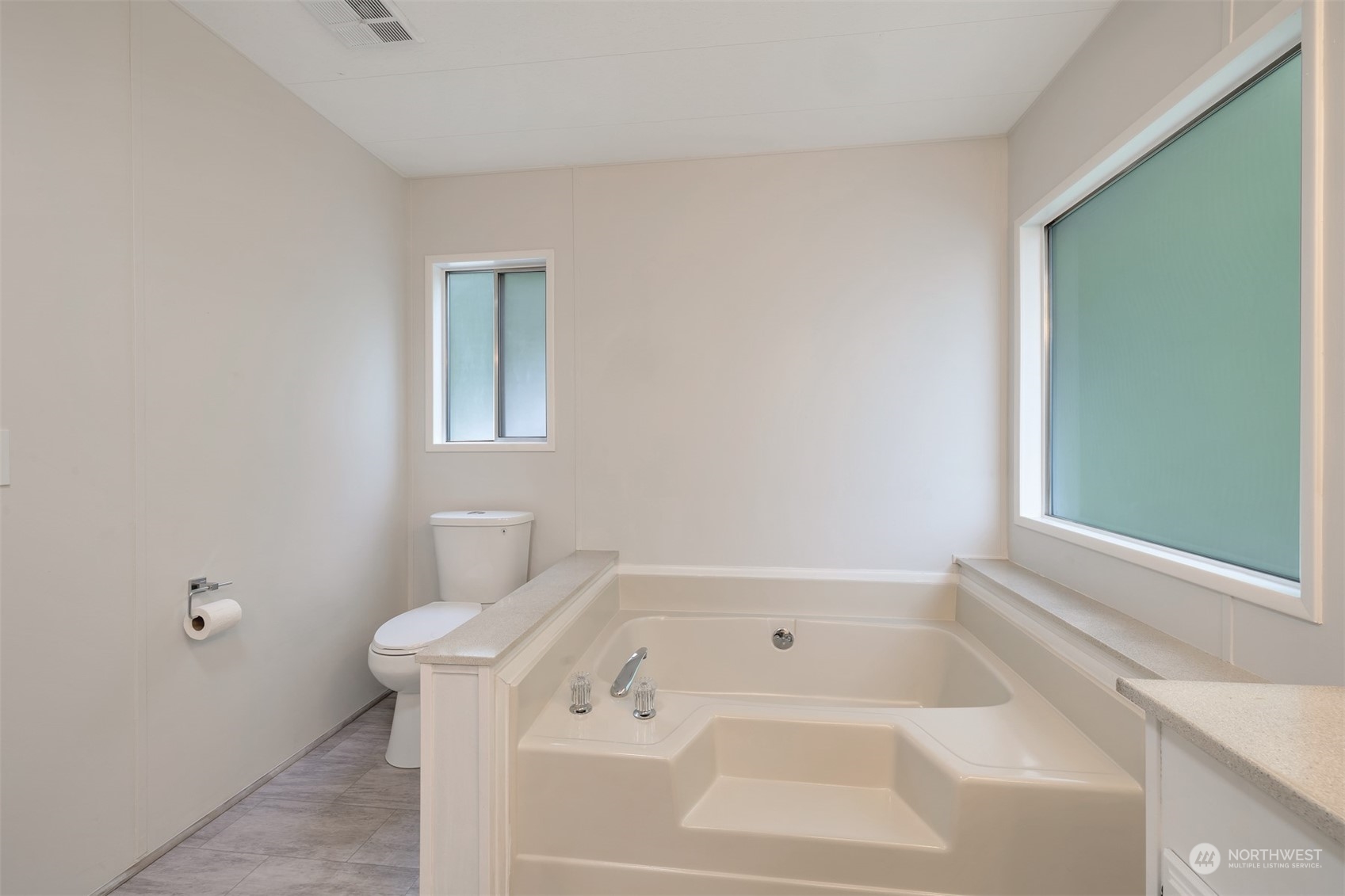 1121 244th Street Southwest, Unit 1 Bothell, WA 98021 - Photo 15 of 25 a bathroom with a bathtub