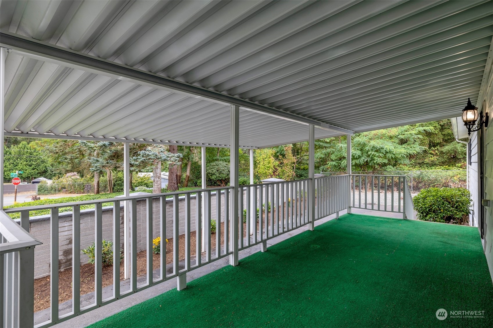 1121 244th Street Southwest, Unit 1 Bothell, WA 98021 - Photo 21 of 25 a view of a backyard with green space