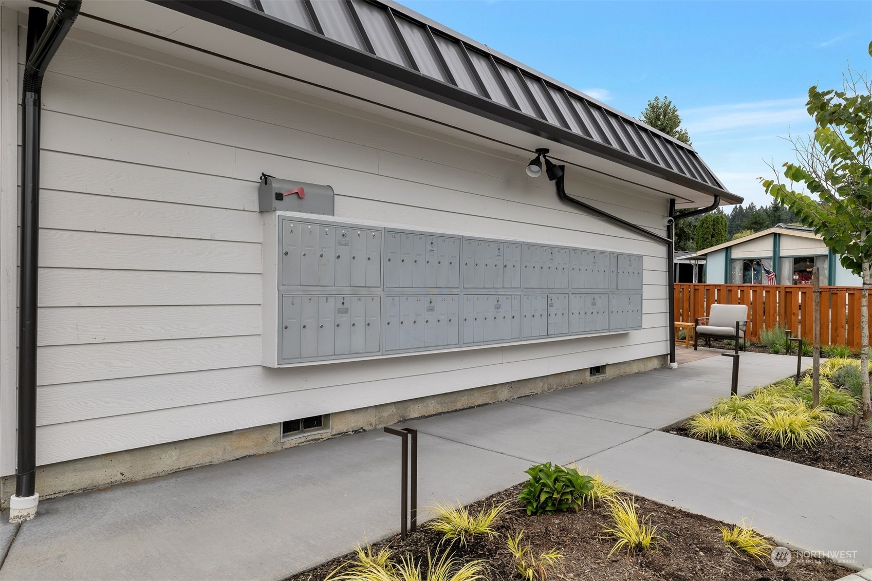 1121 244th Street Southwest, Unit 1 Bothell, WA 98021 - Photo 22 of 25 a view of wooden house with a garage