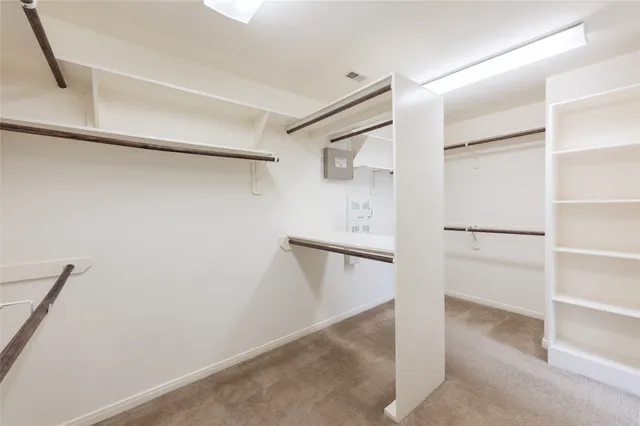 a view of an empty walk in closet